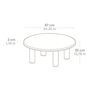 May include: A small, round table with four short legs. The table's diameter is 34.25 inches (87 cm), and it stands 13.78 inches (35 cm) tall. The table's thickness is 1.18 inches (3 cm).