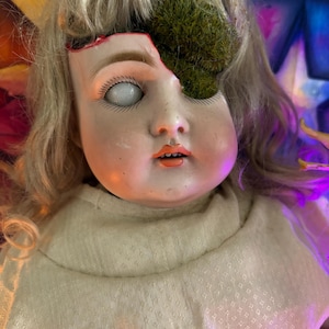 Haunted Doll Highly Active| Abigail: The Blinded Seer| Vessel of Punishment| Used in cruel occult rituals. Sealed menevolant spirits inside.