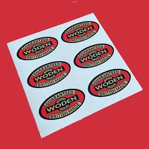 May include: Six red and gold oval stickers with the text "Guaranteed Trade Mark Woden British Made".