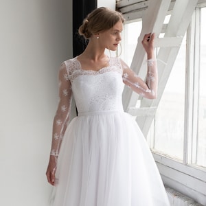Classic long sleeve wedding dress, closed back, white lace, lush tulle skirt, romantic elegant style gown for princess wedding