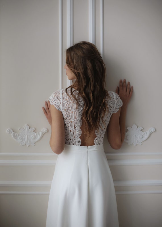 modest backless dress 3/4 Sleeve Modest Wedding Dresses Backless Simple Long Sleeve Wedding Dress  – SheerGirl main image 0