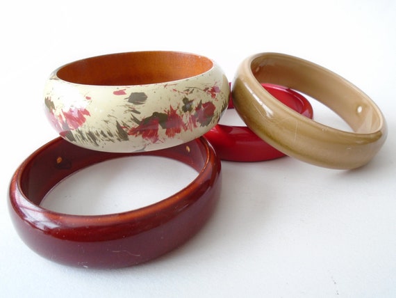 two of them Plastic brown and red cuff bracelets