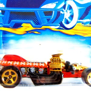 Vintage Hot Wheels, NEW Hot Wheels Gold Toned 2001 Skull n Crossbones Series Rigor Motor 2001 Collector Car 069, Diecast 1/64 Scale