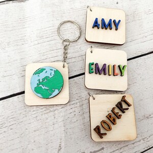 World globe painted keyring with personalised initial on reverse  - 4cm tile - alphabet keyring perfect for small gift or party favour