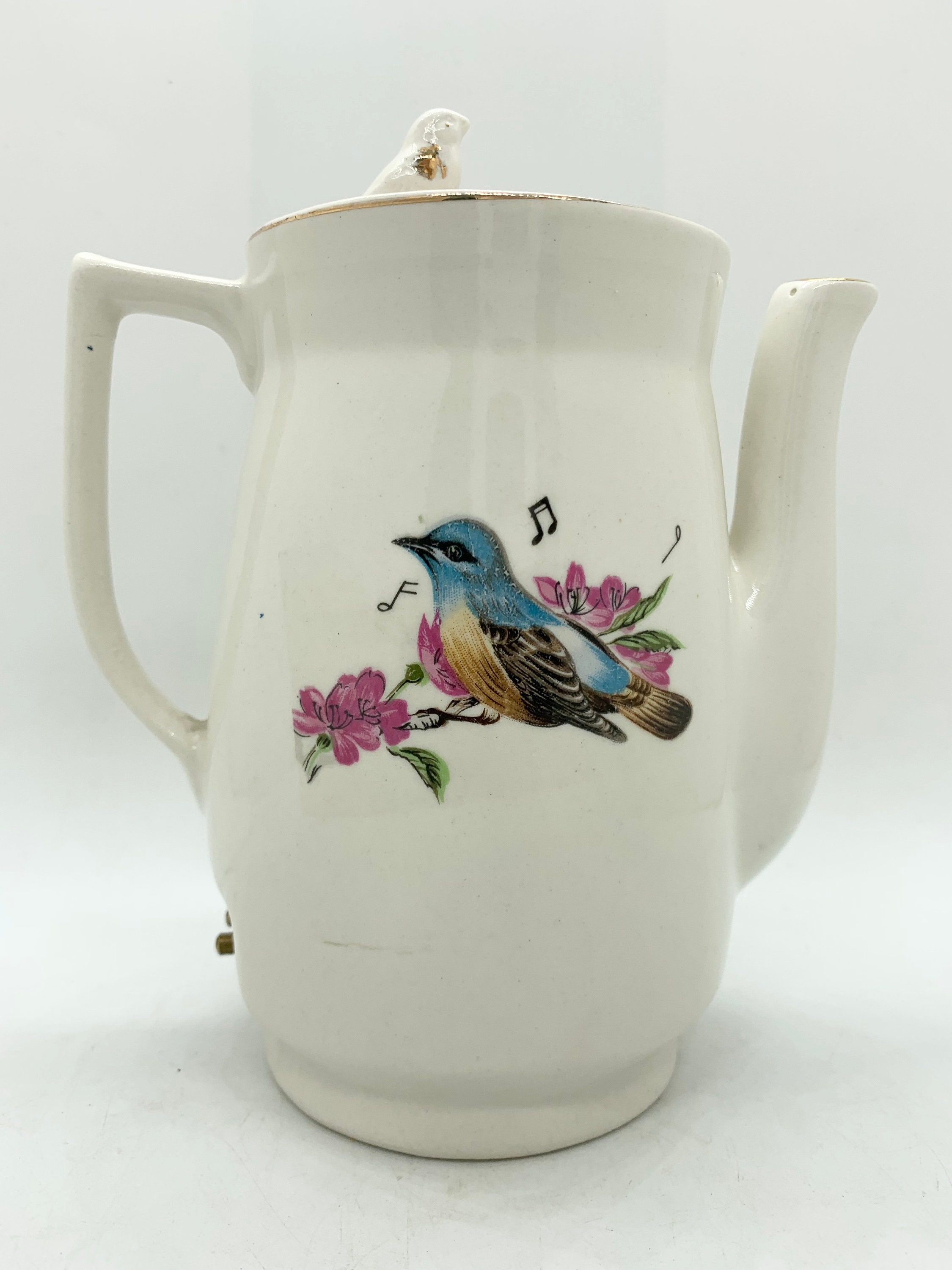 Whistling bird teapot deals