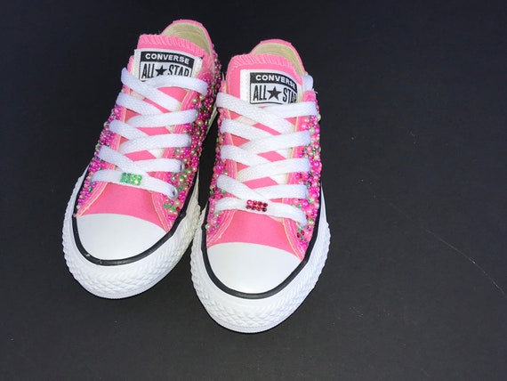 pink and green converse sneakers