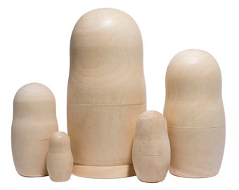 Tomma dockor med näste: 13 cm handsnidad matrjosjka i lindträ (5 delar)
