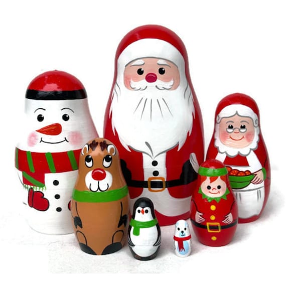 Bambole nidificanti di Babbo Natale dipinte a mano: decorazioni