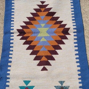 Egyptian Handmade Wool Rug approximately 55 inches by 27 inches or 140 cm by 68 cm--Do not catch Fire and lasting colors