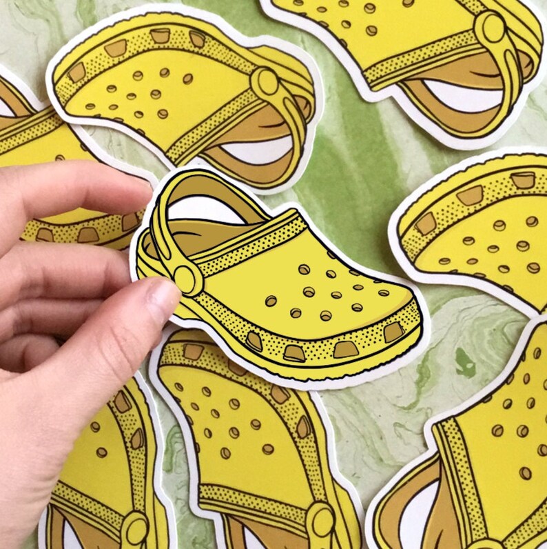 yellow crocs with stickers