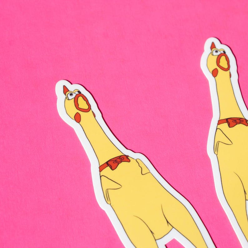 May include: Two yellow rubber chicken stickers with red bows on a pink background. The chickens are looking up with their mouths open.