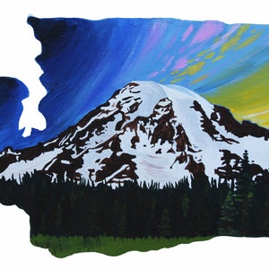 May include: A painting of Mount Rainier, a snow-capped mountain, in the shape of the state of Washington. The sky is a vibrant blue with pink and yellow clouds. The mountain is surrounded by dark green trees and a grassy field.