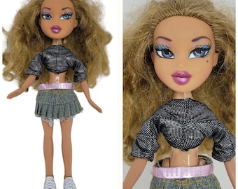 Lalka Bratz Hollywood Style Yasmin Jasnobrązowe Włosy Beauty Mark Glitter Ubrana