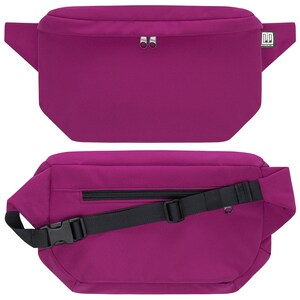 May include: A purple fanny pack with a black adjustable strap and a zippered pocket. The pack has a small logo on the front that says "PP FREAKLIN".