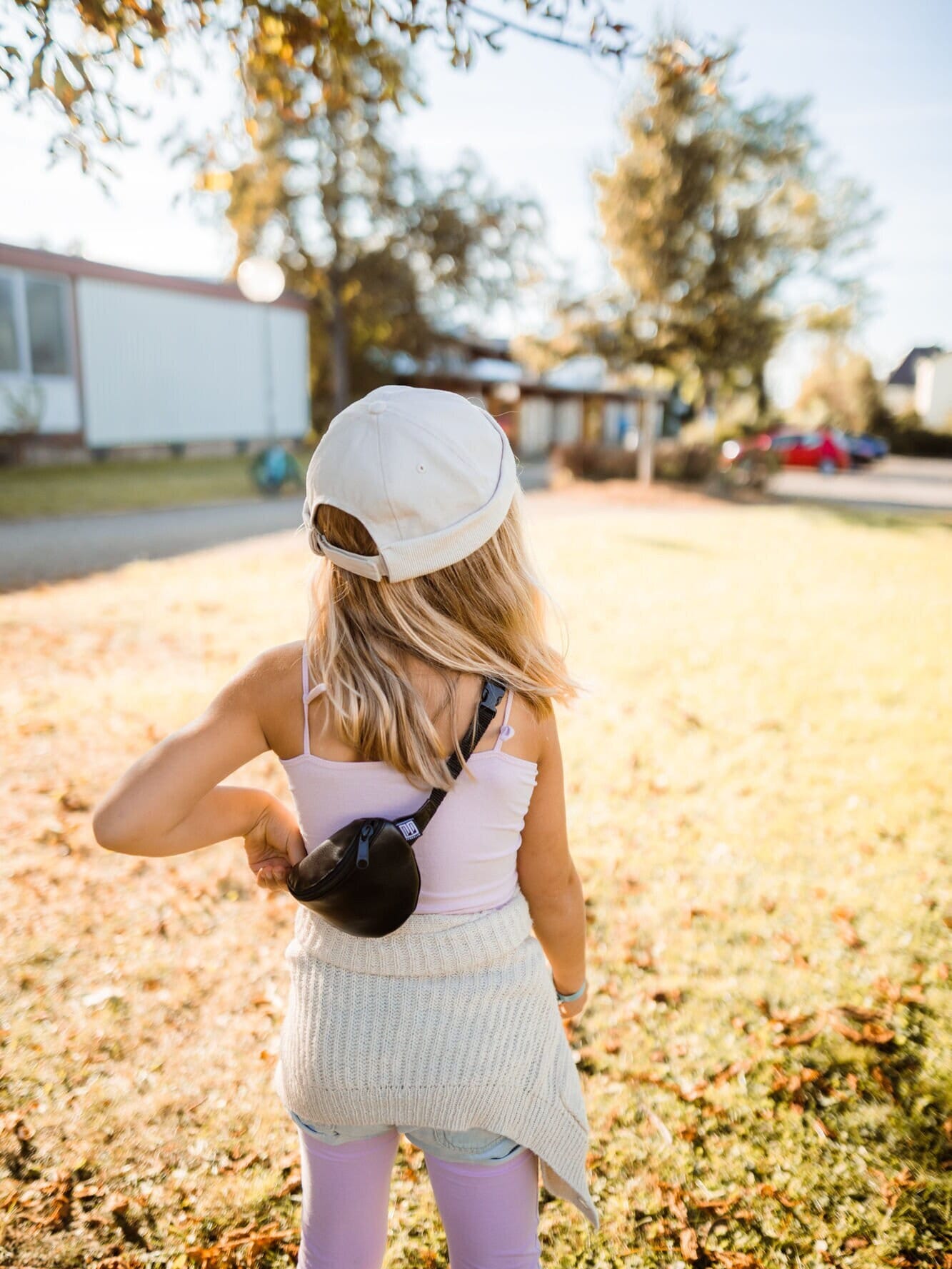 Versatile black faux leather mini fanny pack: Lightweight, durable, and vegan, for kids and adults. Hand-sewn with love in Berlin.