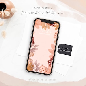 Könnte beinhalten: Eine handgemalte Smartphone-Tapete mit rosa Hintergrund und einem floralen Design in Braun-, Orange- und Rottönen. Die Tapete zeigt den Text "10:24" und "Dienstag, 13. September".