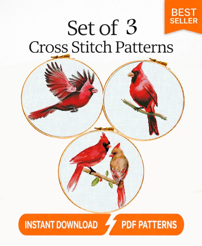 May include: Set of 3 cross stitch patterns featuring vibrant red cardinal birds. Each design is framed in a wooden embroidery hoop. The image includes the text "Best Seller" and "Instant Download PDF Patterns".