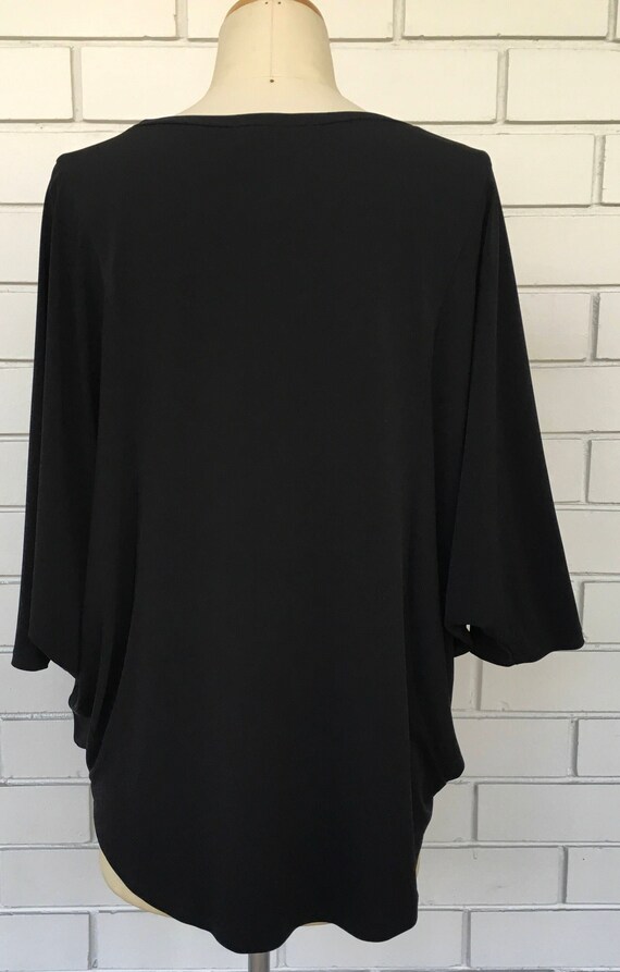 black batwing top
