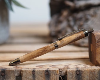 A premium click style pen made from a stunning piece of spalted oak wood. Fathers Day. Birthday. Retirement. Writing. Gift. Pen.