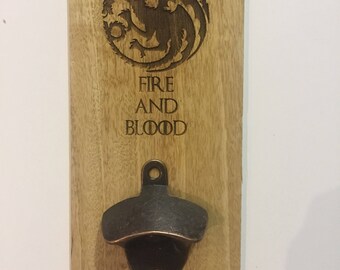 Wall mounted bottle opener