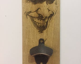 Wall mounted bottle opener