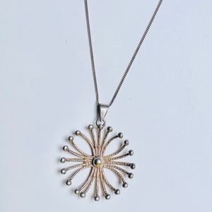 A wonderful Modernist Sterling silver pendant by Finnish goldsmith Pekka I Aulin in 1960s. Made in Finland