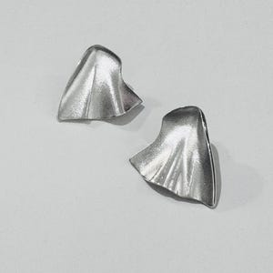 A pair of big Modernist Sterling silver Lapponia earrings named Lilia 1997 ,  Made in Finland