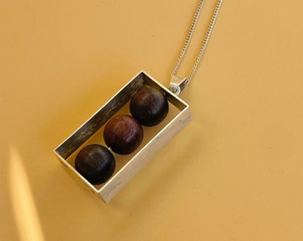 Rare Modernist Sterling silver pendant with teak by Reino Juhani Sarosto, 1961, Made in Finland