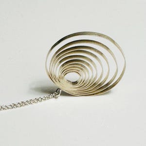 Modernist Finnish sterling silver pendant with the style of Tapio Wirkkala’s kinetic necklace , made in Finland