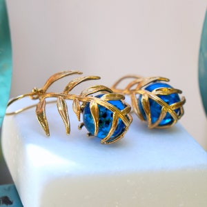 Statement Unique Earrings for Women.  Araucaria Leaf 14k Gold on sterling Silver and Blue Murano inside. Plant earrings by Mother Nature