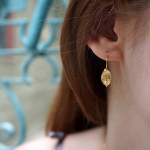 Small Rose plant leaf Earrings in sterling Silver or Gold plated on it . Roses are ancient symbols of Love and Beauty.