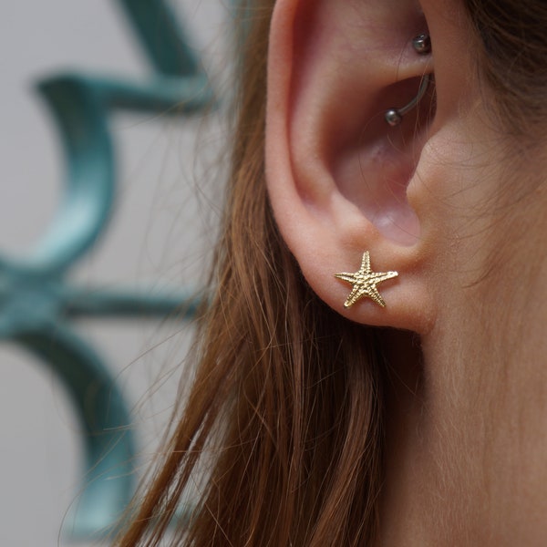 Solid gold stud earrings starfish. Star Fish symbolizes the 5 elements. Earth, Air, Water, Fire, Spirit.