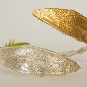 Olive Leaf cuff bracelet in sterling silver and 14K Gold plated . Olive is a symbol of peace and protection.