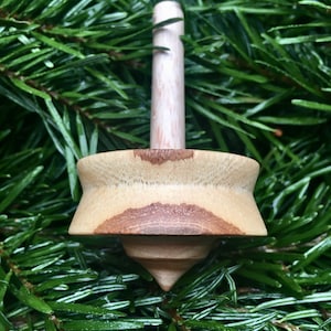 spinning top, hand turned, dexterity toy, rustic wood
