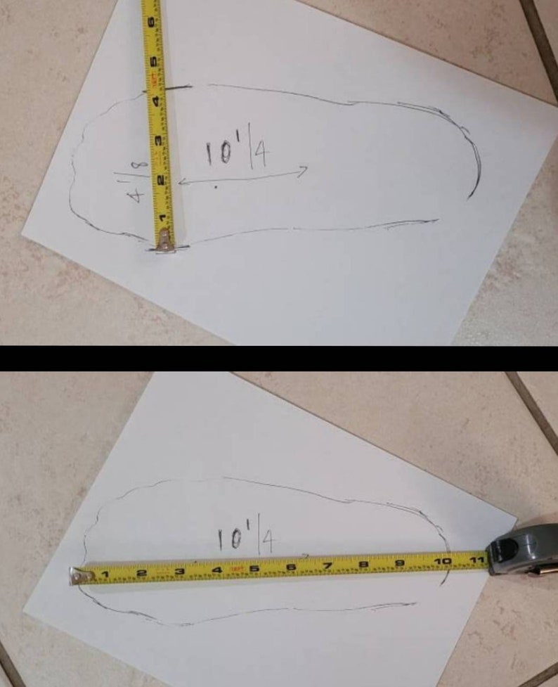 May include: A white sheet of paper with a pencil drawing of a foot outline. A yellow measuring tape is placed along the outline of the foot. The tape reads "10 1/4".