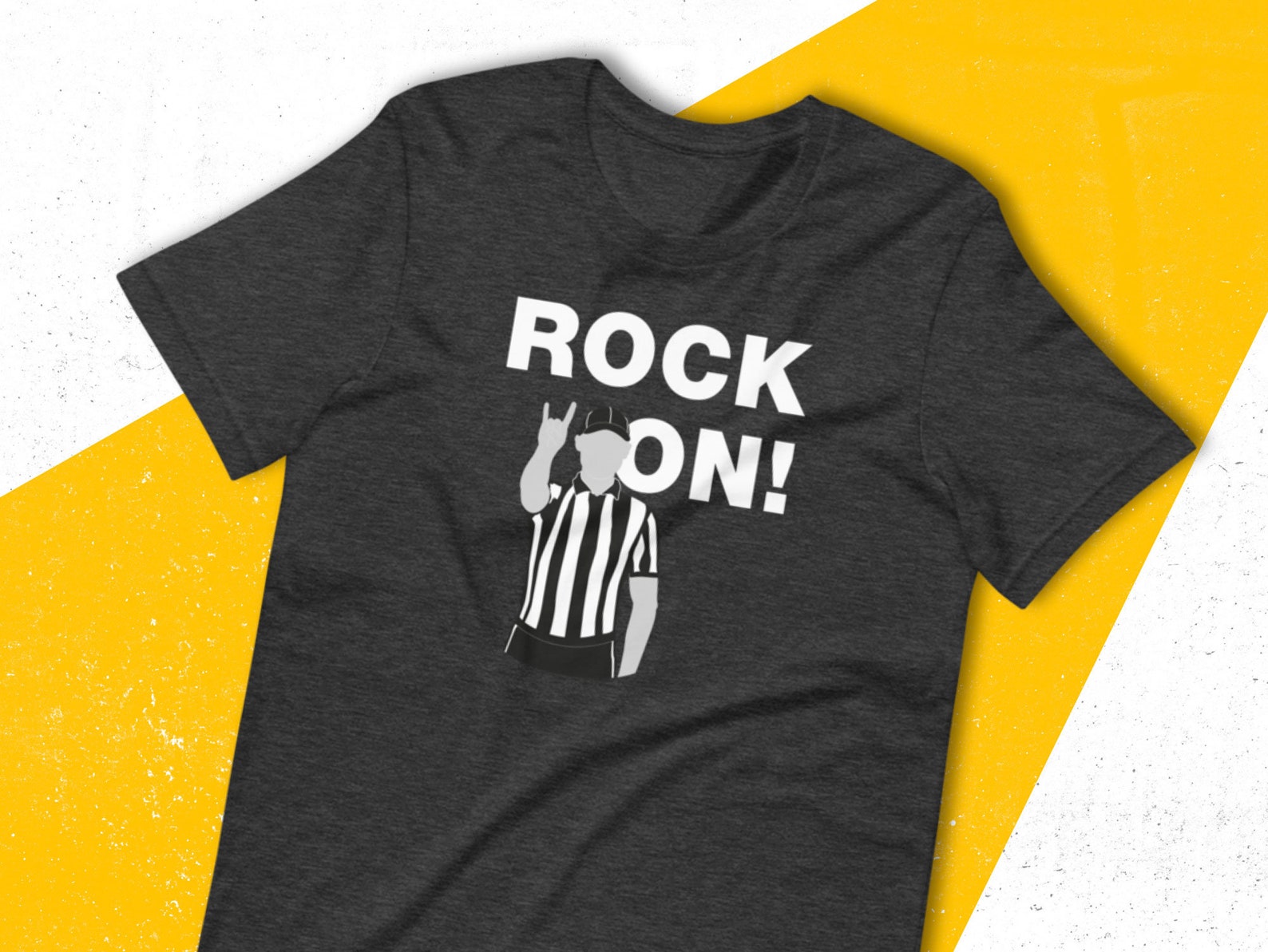 Mock up of unisex shirt saying 'Rock on' with referee on it