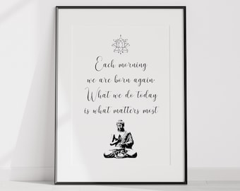 May include: Black and white printable wall art featuring a quote about mindfulness and a stylized image of a meditating Buddha. The quote reads "Each morning we are born again. What we do today is what matters most."