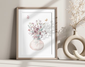 May include: A framed watercolor painting of a bouquet of pink and purple flowers in a pale pink vase with two butterflies flying above the flowers.