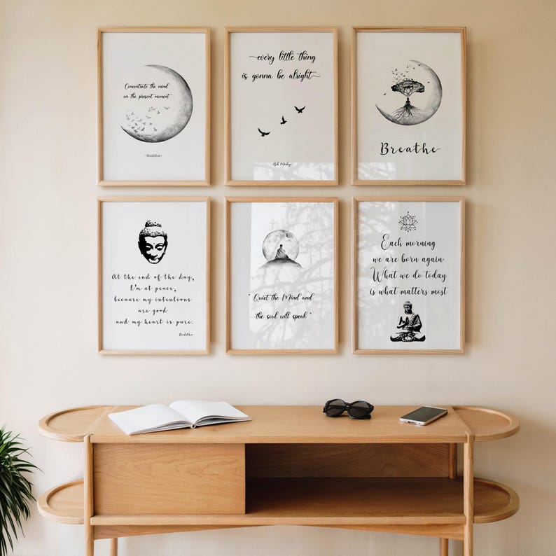 May include: Six framed art prints with inspirational quotes and illustrations. The prints feature black and white designs with quotes like "Every little thing is gonna be alright" and images of a moon, birds, and a meditating figure.