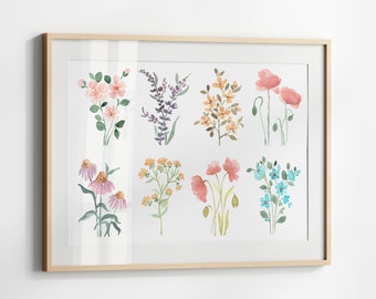 Può includere: Una stampa ad acquerello incorniciata che presenta nove diversi tipi di fiori, tra cui rose rosa, lavanda viola, fiori selvatici gialli e nontiscordardime.