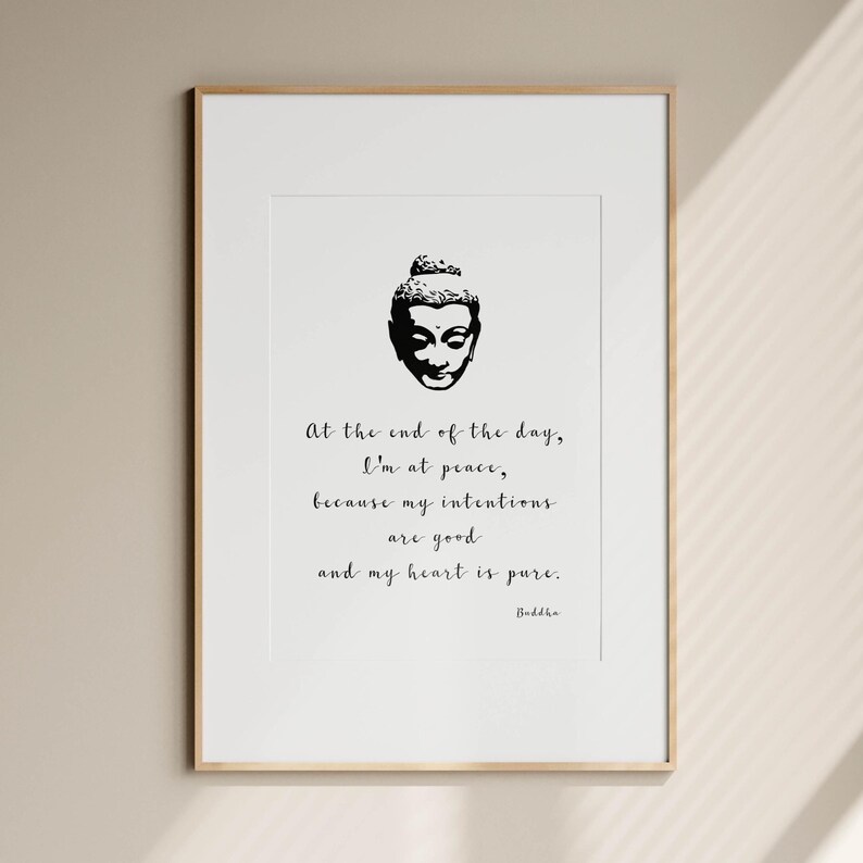 May include: A framed print featuring a black and white illustration of a Buddha head. The print includes the quote, "At the end of the day, I'm at peace, because my intentions are good and my heart is pure." The word "Buddha" is at the bottom.