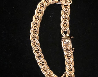 Beautiful 7 3/8 inches Woman’s 1/20 12 K Gold filled Bracelet with safety clasp in Excellent Condition