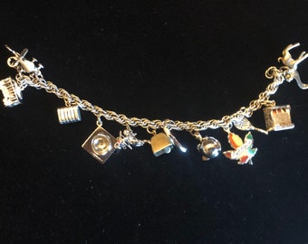 Beautiful  7 inch Vintage Sterling Silver Charm Bracelet (weighs 1.6 Troy Oz). Unisex
