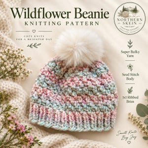May include: A Wildflower Beanie knitting pattern document featuring a multi-colored pastel knit hat with a white faux fur pom-pom. The text includes Wildflower Beanie, Knitting Pattern, Northern Skein, Super Bulky Yarn, Seed Stitch Body, and 1x1 Ribbed Brim.