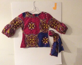 Ankara tops with puff sleeves and a head wrap