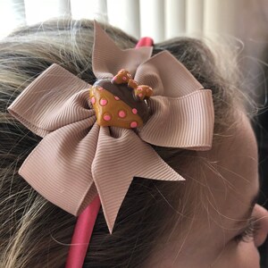 Coral headband with Beige bow and heart detail