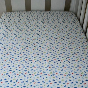 Hoja de cuna ajustada (camiones y coches)