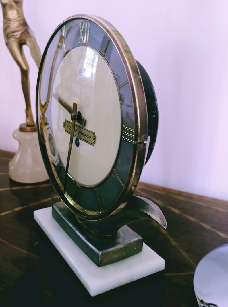 deco red enamel spelter on marble bookends
