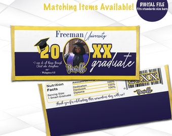 May include: A graduation-themed candy bar wrapper with a gold border, featuring the text "Freeman University" and "XX Graduate." Includes a photo, the graduate's name, and a Bible verse. The design is in navy blue and gold.