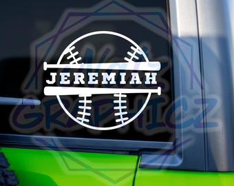 May include: White baseball-themed decal with the name "JEREMIAH" displayed across the center. The design includes a baseball and two bats, suitable for application on a car window or similar surface.